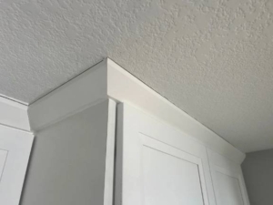 A gap appears between the cabinets and the ceiling in winter.